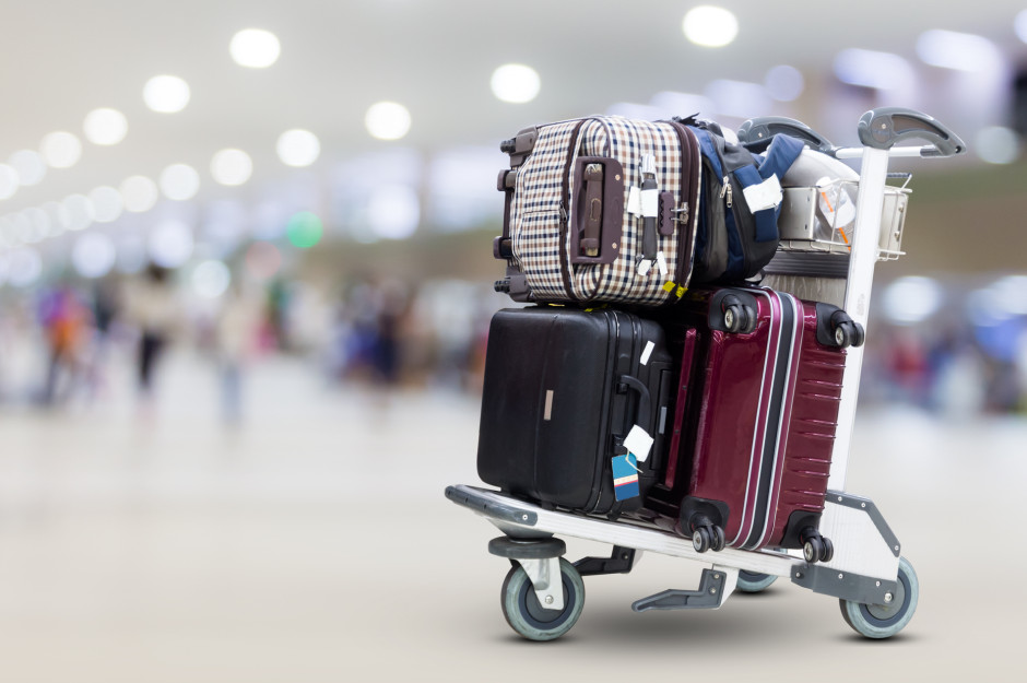 68807b46-f901-4f68-a902-05c9c0d643e3-airport-luggage-trolley-with-suitcases.jpg