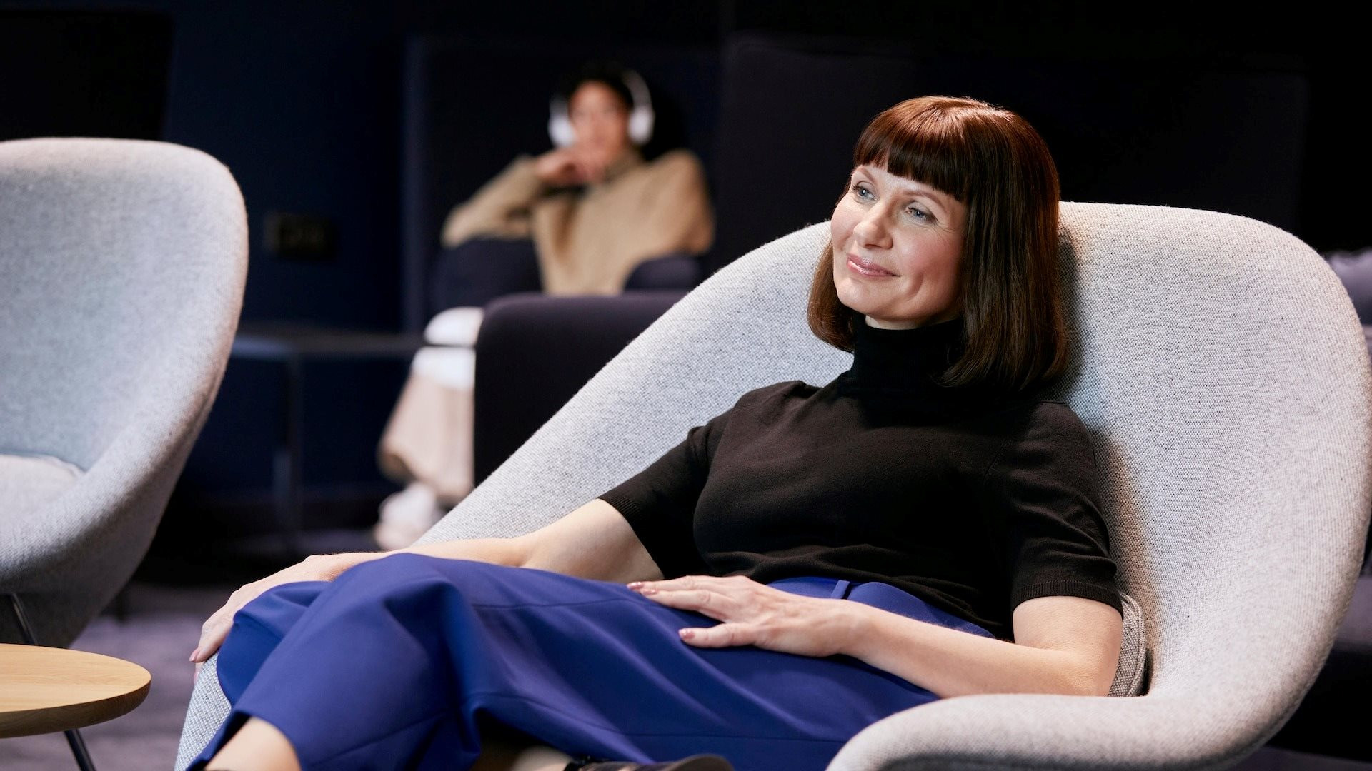 woman-sitting-in-a-lounge-data.jpg