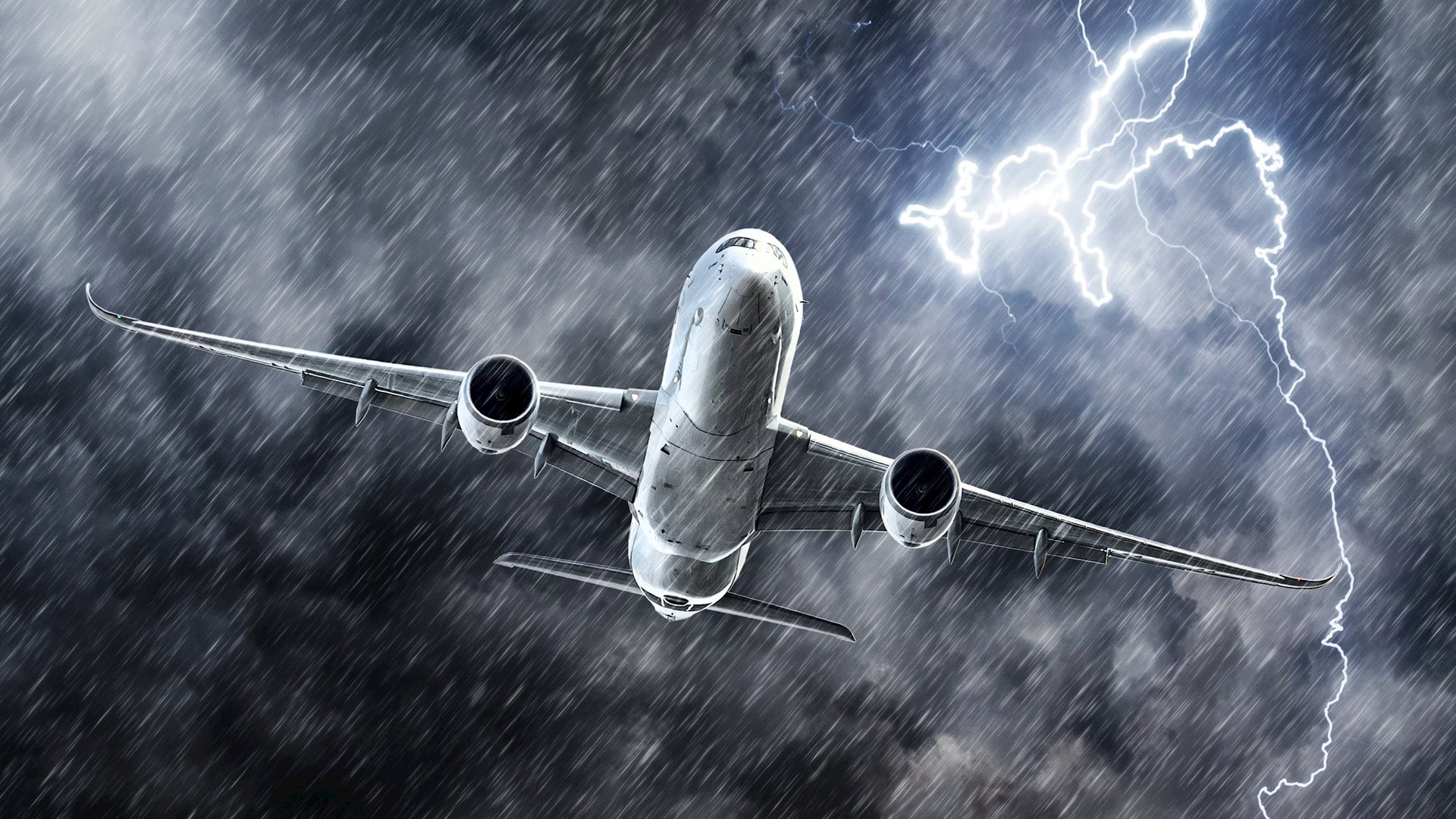 powerful-thunderstorm-lightning-strike-and-heavy-rain-in-the-sky-passenger-airplane_16_9_1055029697.jpeg