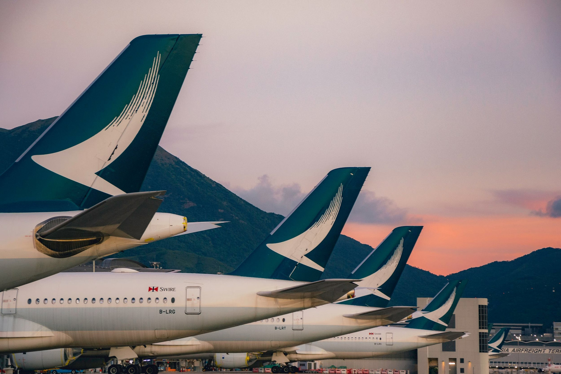 cathay-pacific-aircraft-parked-at-hkg-shutterstock_2048211518.jpg