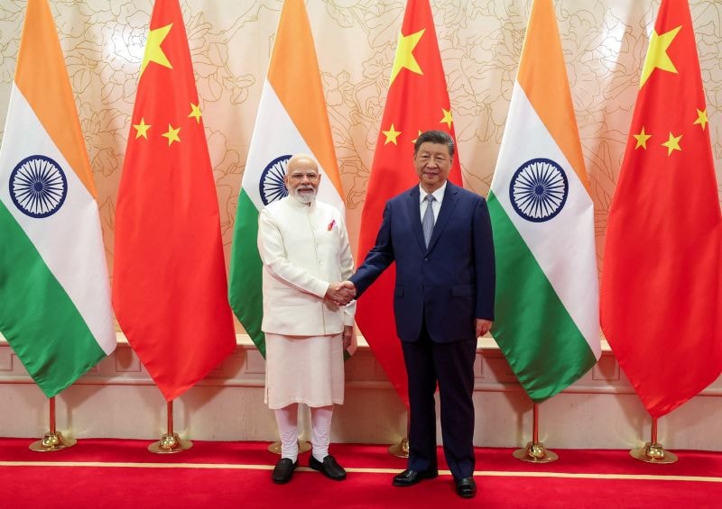 India's Prime Minister Narendra Modi shakes hands with Chinese President Xi Jinping during a meeting on the sidelines of Shanghai Cooperation Organisation (SCO) Summit in Tianjin, China, on August 31, 2025.