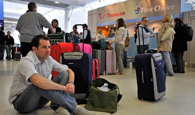 Compensation plea: Passengers delayed at Manchester airport at Thomson check-in desk.