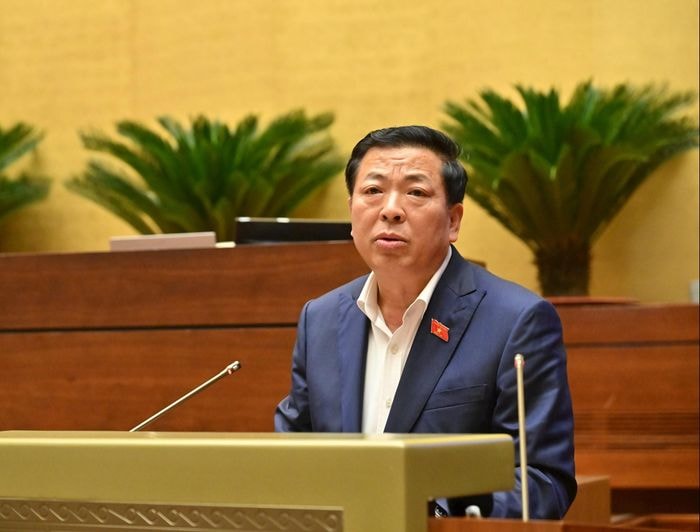 Bộ trưởng Trần Hồng Minh tại nghị trường chiều 12/11. (Ảnh: Media Quốc hội)